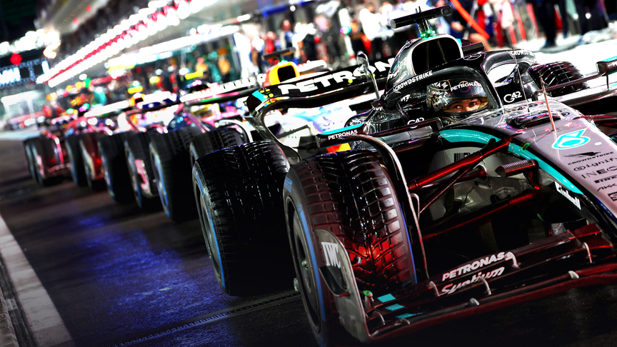 Formula One pit lane with racing cars at the Las Vegas Grand Prix