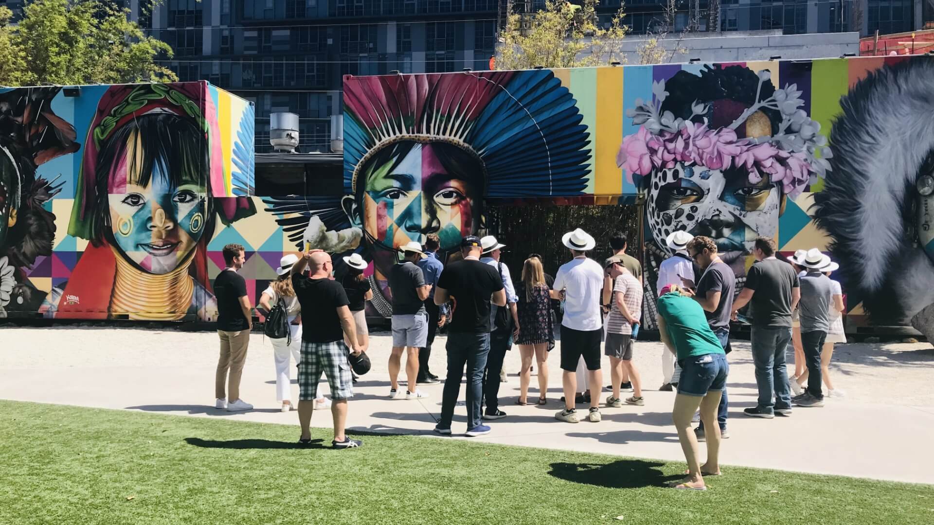Visitors viewing street-art murals in Wynwood, Miami